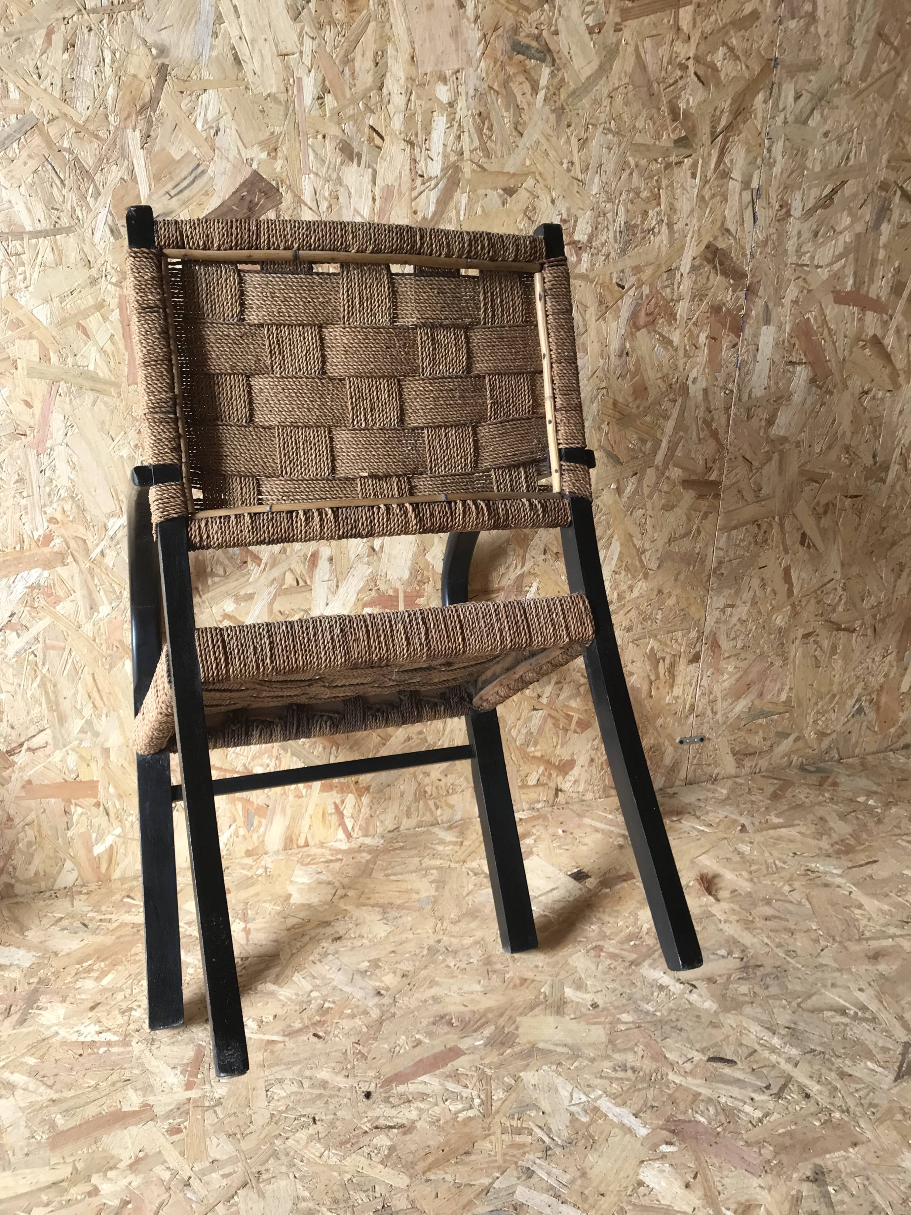 Vintage armchair with woven cord and wooden frame, Axel Larsson, circa 1960.