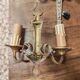 Two antique wall sconces in gilded bronze in the Louis XVI style.