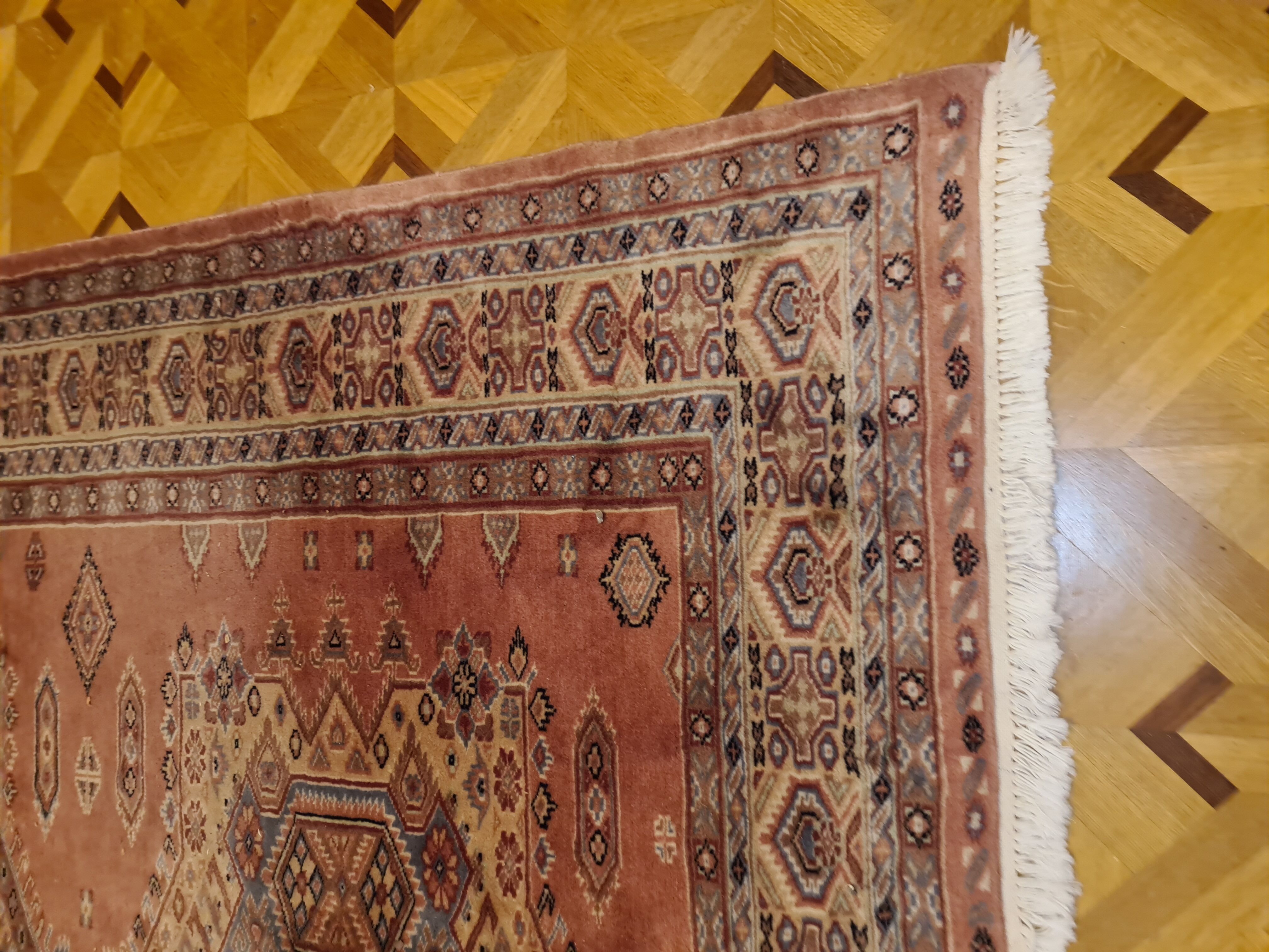 Handmade pink oriental carpet
