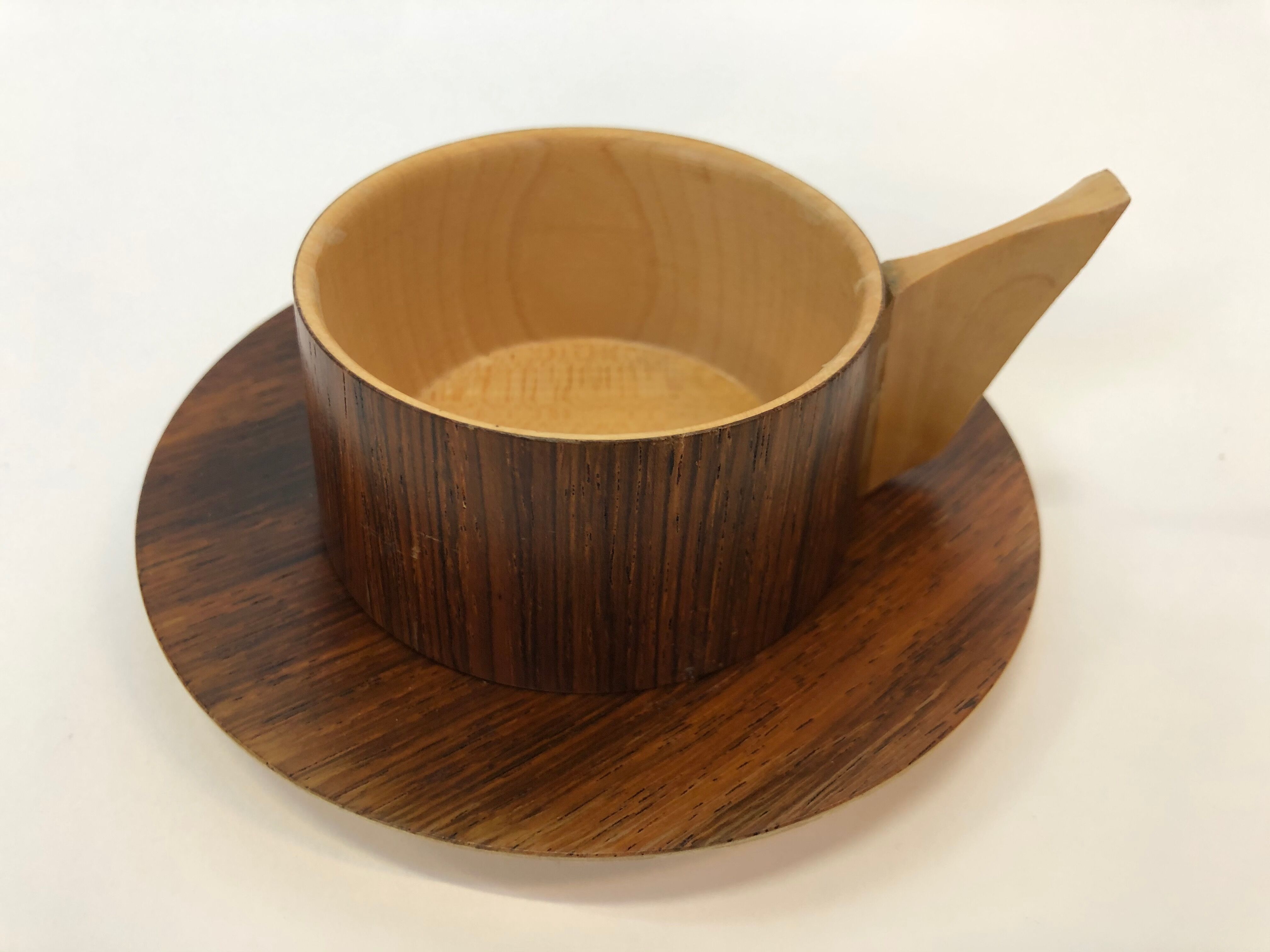 Vintage wooden cups and saucers in teak