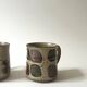 Set of 2 glazed ceramic coffee mugs from around 1970.