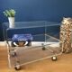 Altuglass roller TV table/furniture by David Lange with sliding tray