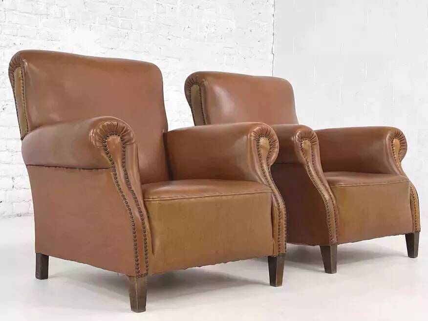 Pair of club armchairs from the 50s in imitation and wood