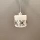 Scandinavian hanging lamp in white glass with inlayed black motifs.