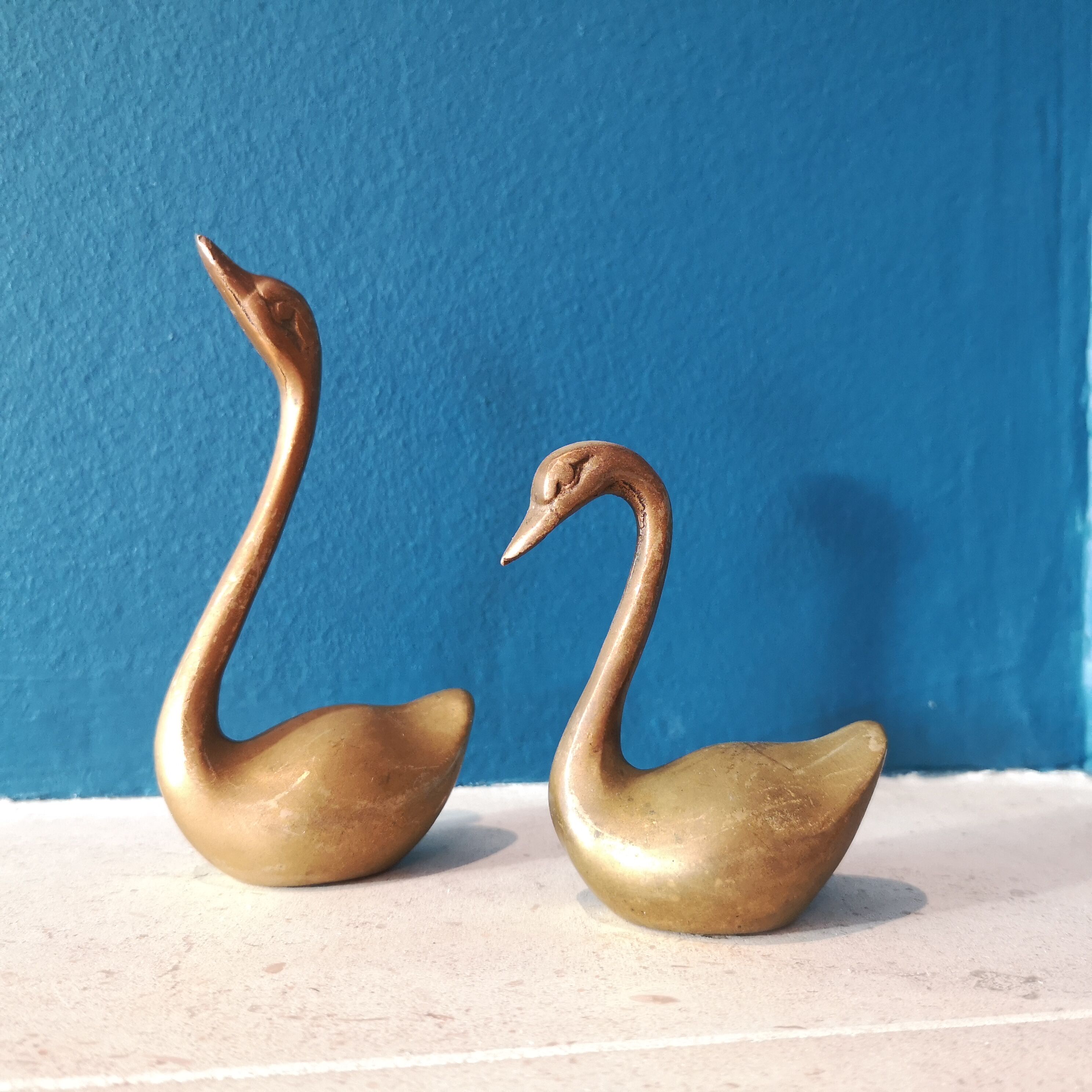 Couple of brass swans