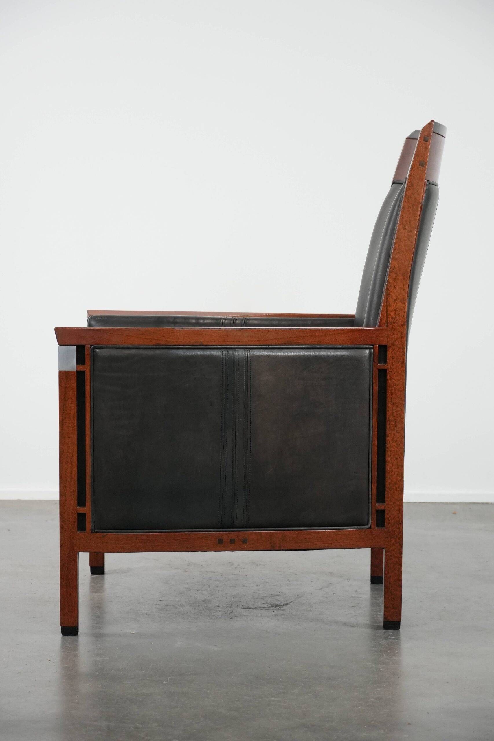 Black cow leather armchair in Art Deco design