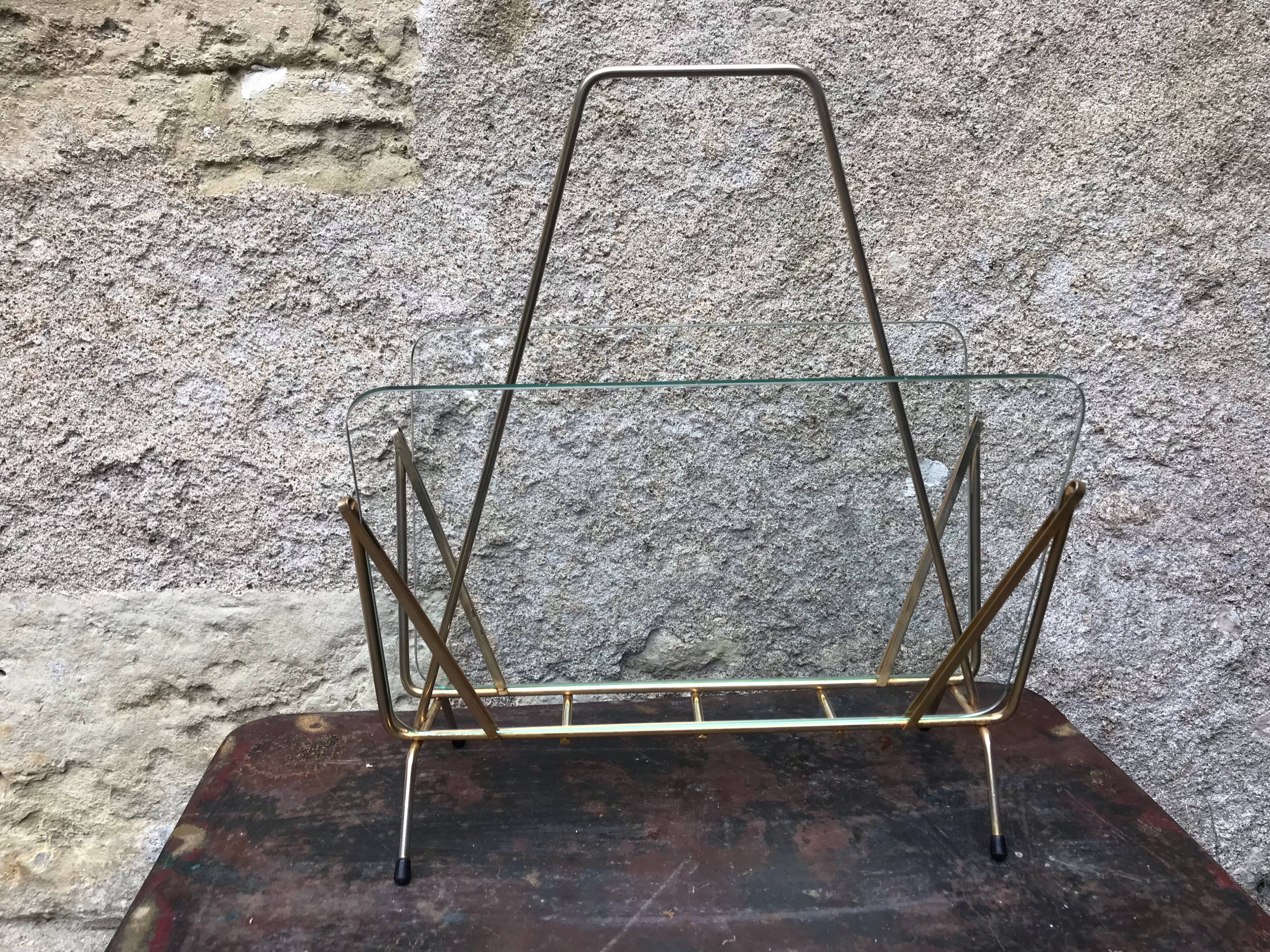 Glass and gold metal magazine door