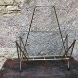 Glass and gold metal magazine door