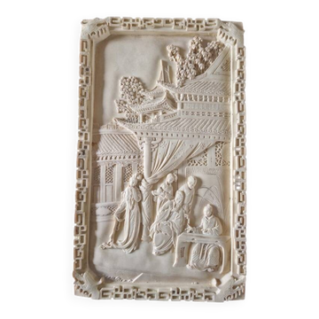 Sculpted resin plaque in the style of China.
