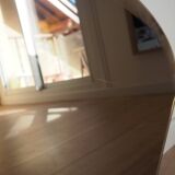 Smoked beveled mirror