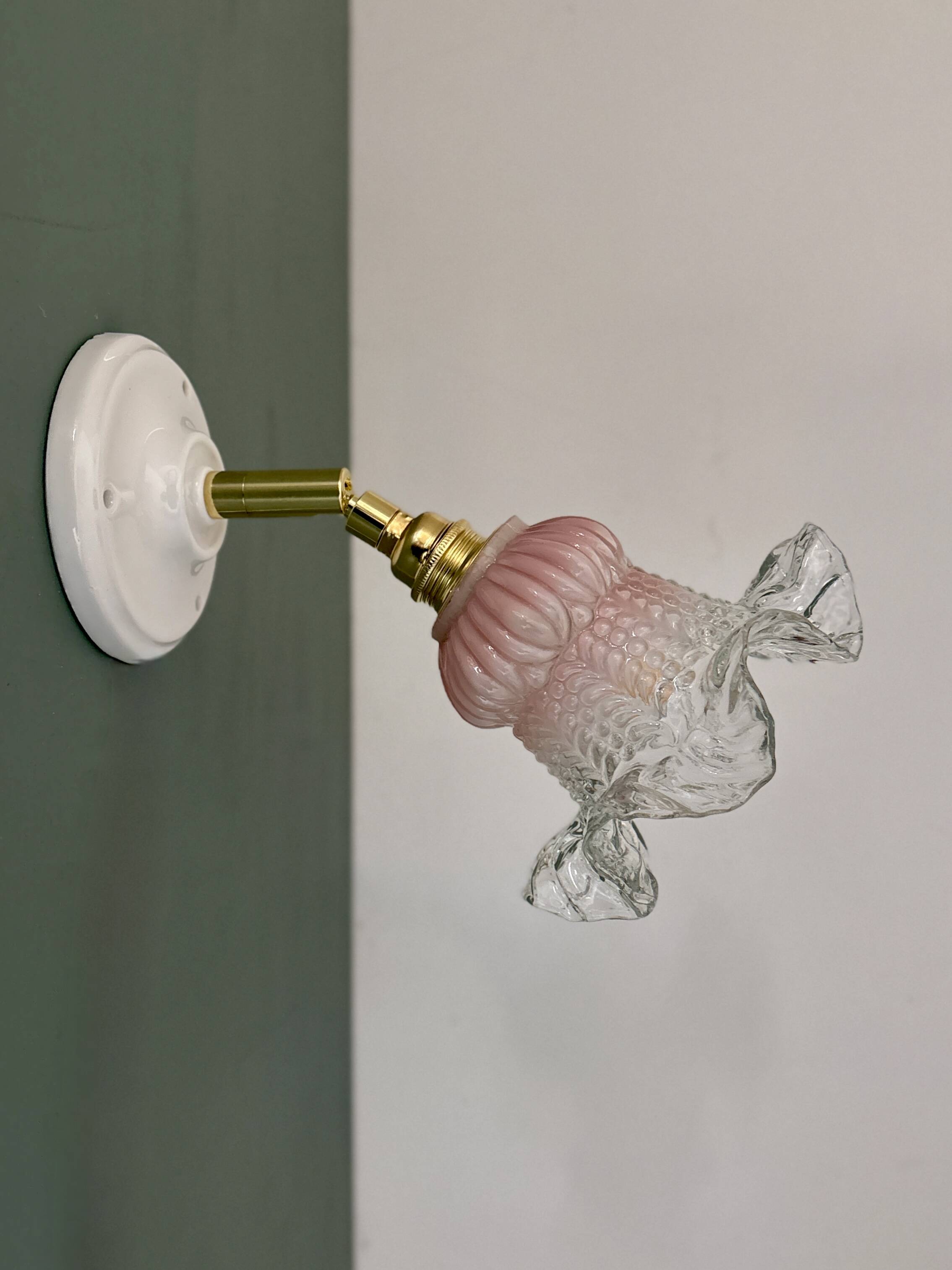 Vintage pink and clear glass tulip wall light.