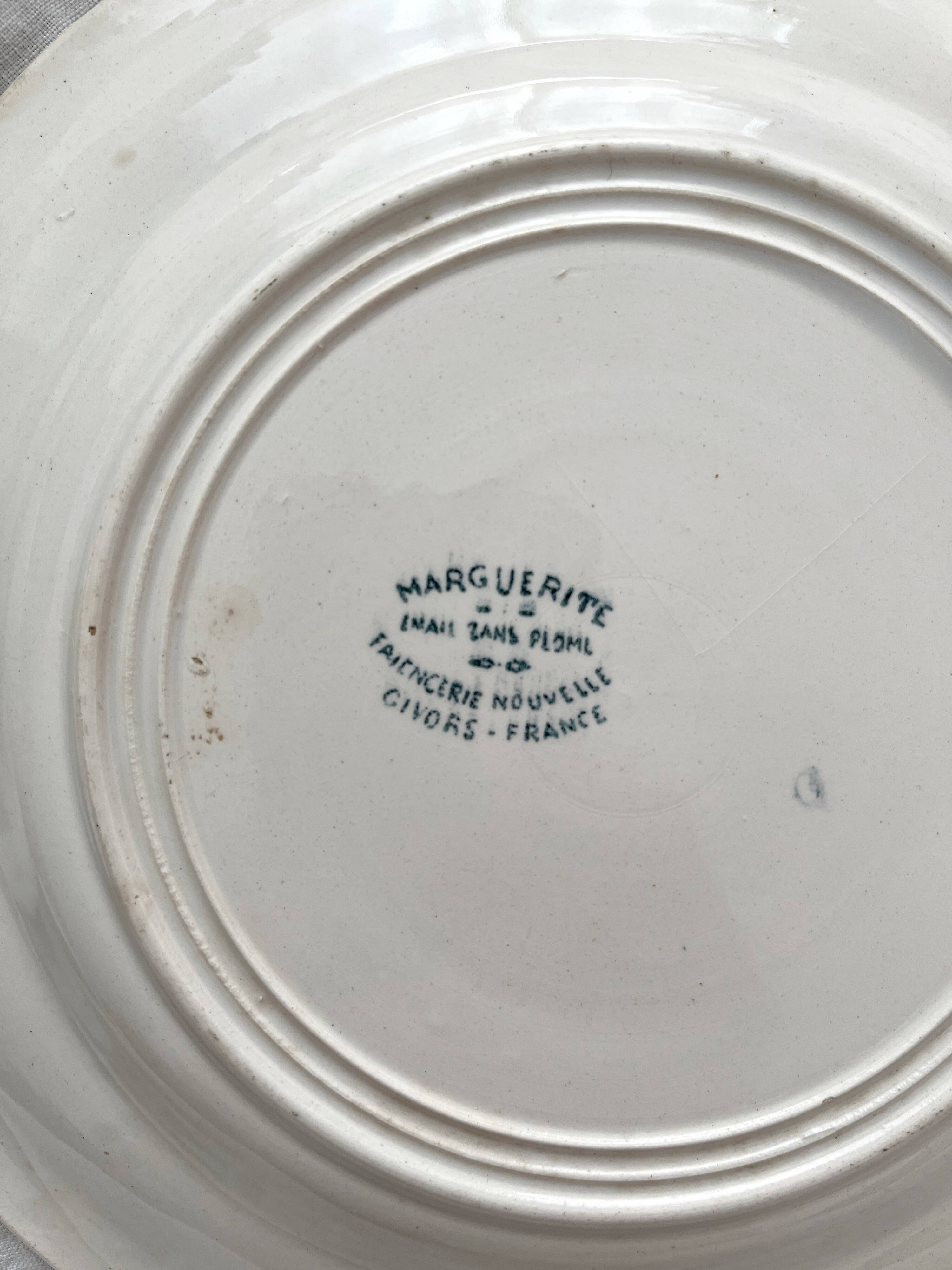 7 "Marguerite" ironstone dessert plates from the Nouvelle Givors pottery factory