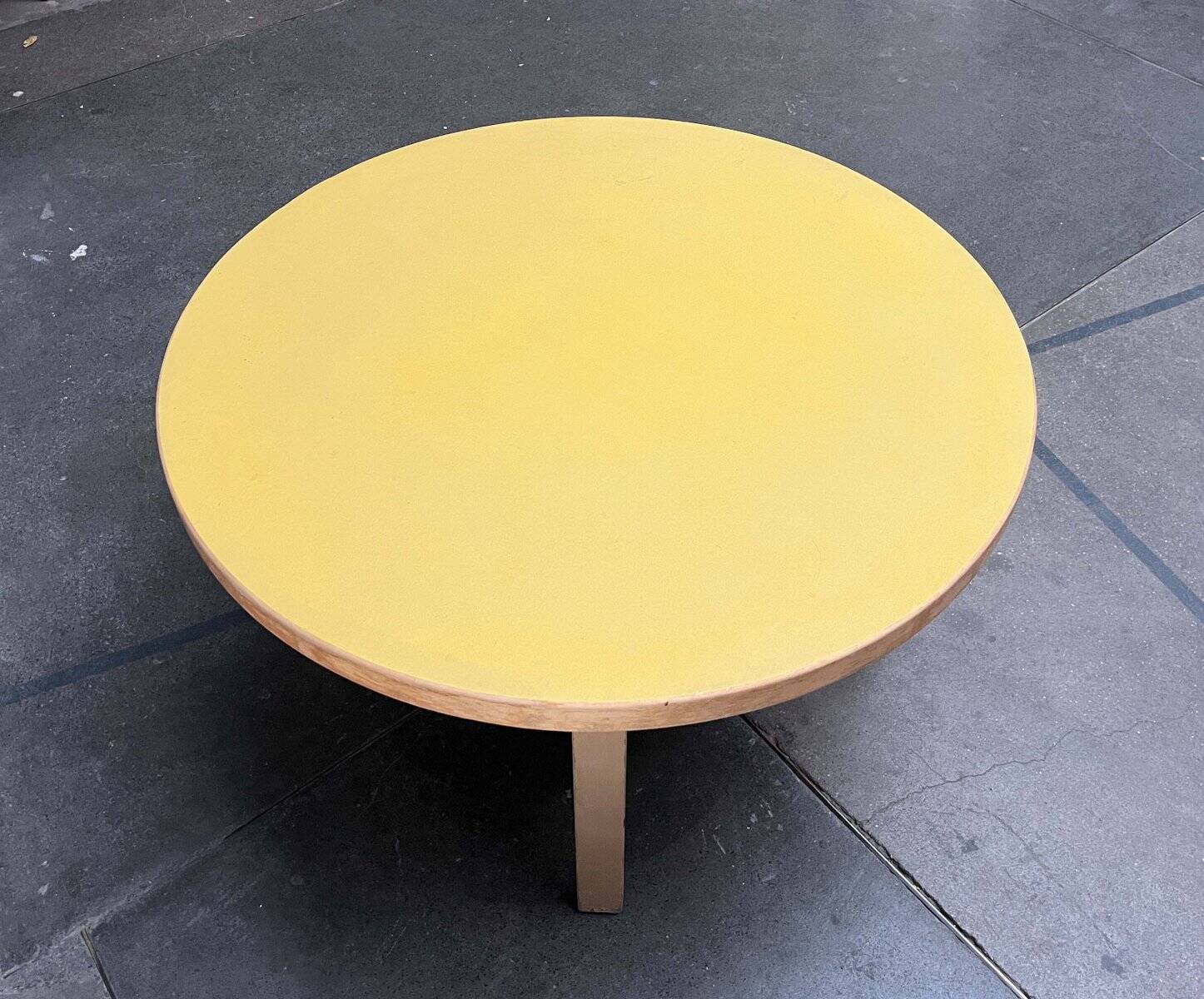 Mid-century modern yellow linoleum coffee table by Alva Aalto for Artek, Finland, 1960s.