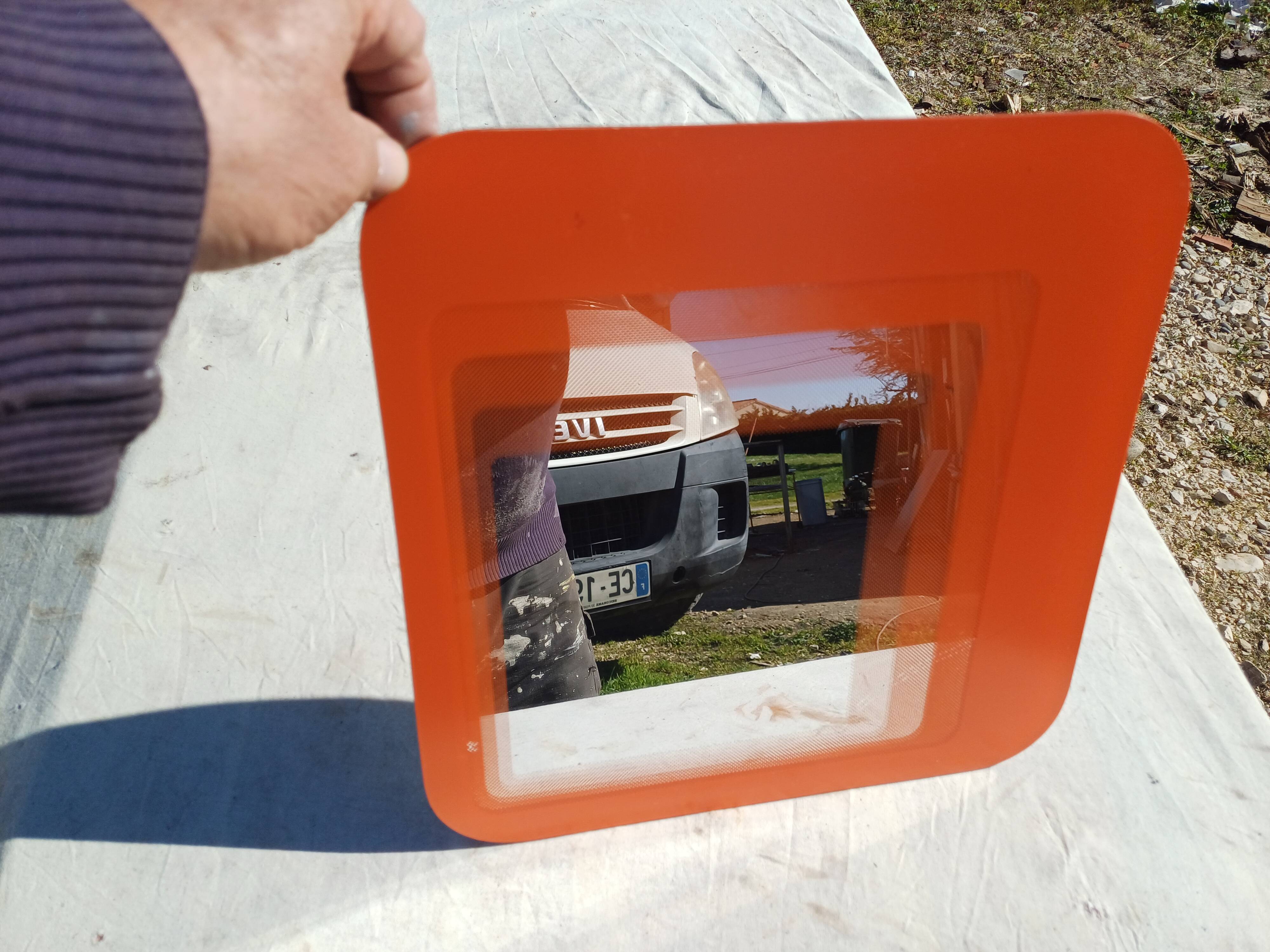 Vintage orange glass mirror