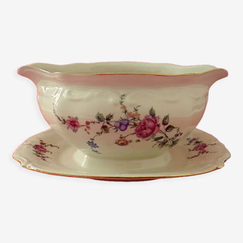 Saucière en porcelaine de couleur crème à décor floral