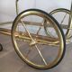 Neo-classical table in gilded metal and glass