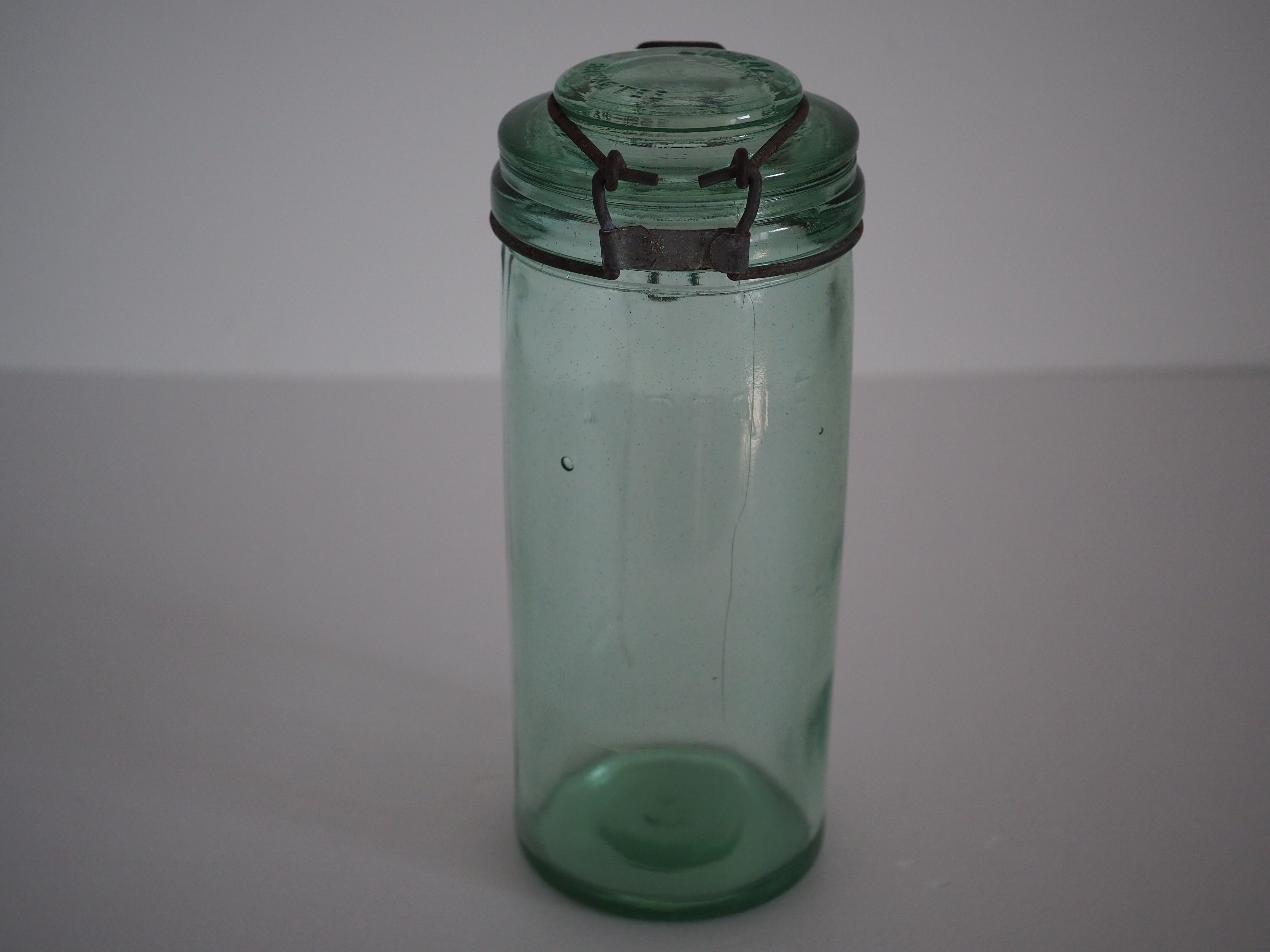 Green "ideale" glass canning jar