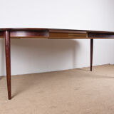 Danish extendable dining table in Rio Rosewood model 55 by Arne Vodder for Sibast 1958.