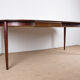 Danish extendable dining table in Rio Rosewood model 55 by Arne Vodder for Sibast 1958.