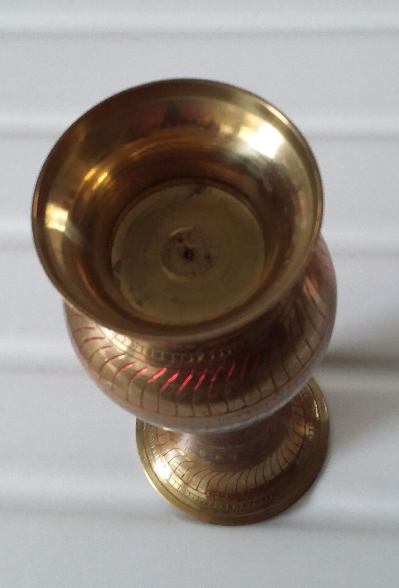 Engraved brass vase
