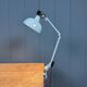 Light grey Rademacher clamp lamp with large enamel shade