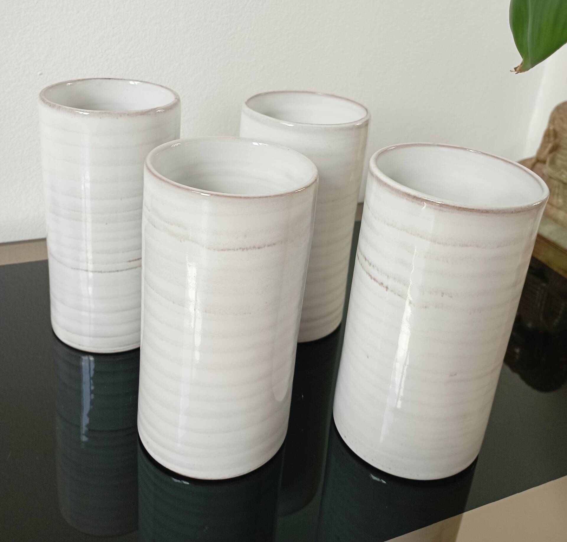 4 vintage stoneware cups in white
