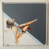 Seated woman painting