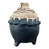 Clay pot and raffia