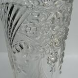 Glass vase with stylized flower pattern