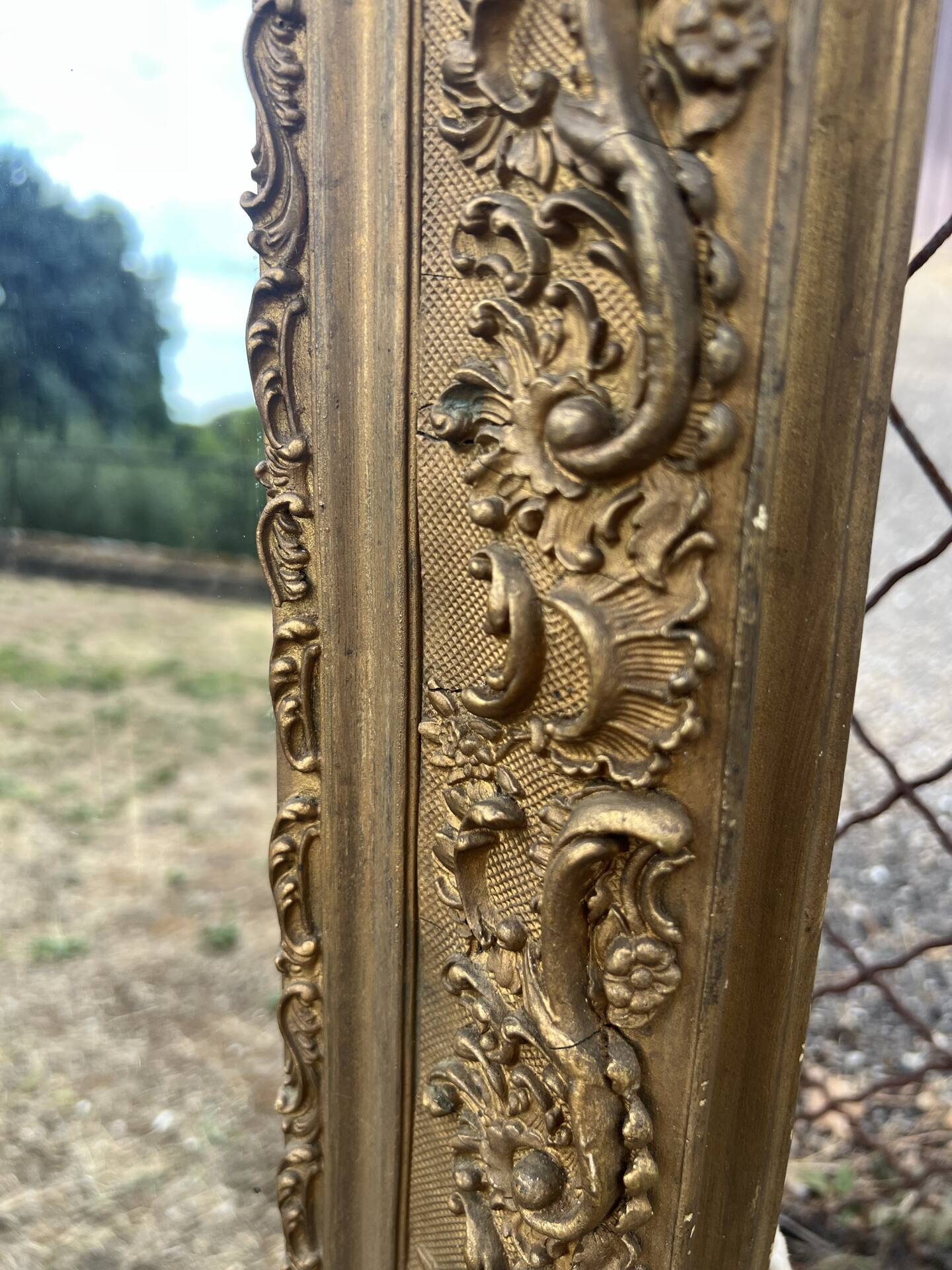 Large gilded sculpted Louis-Philippe mirror, mercury 104x77cm