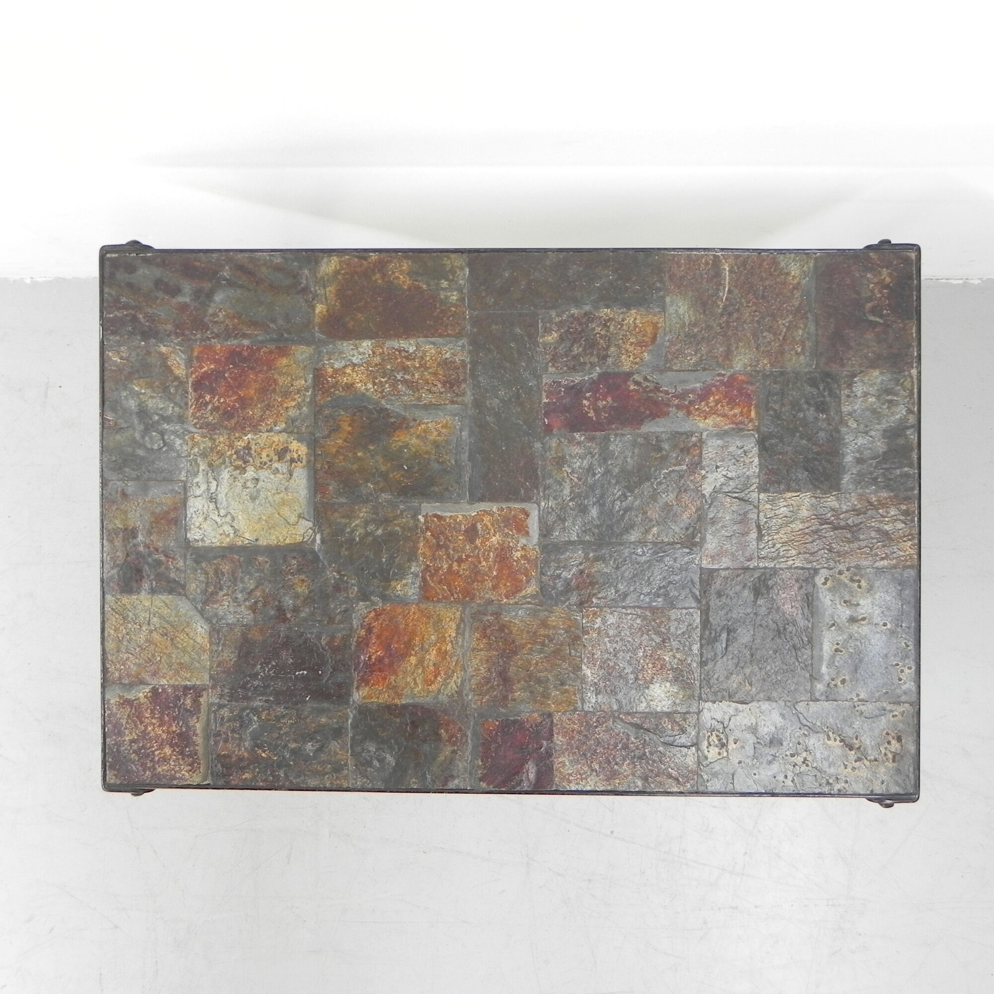 Brutalist coffee table with slate top