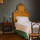 Antique wooden and fabric headboard, Italy, 19th century.