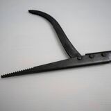 Fireplace accessory designed by Pep Bonet for Alessi, 1980.