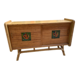 Rattan sideboard with ceramics