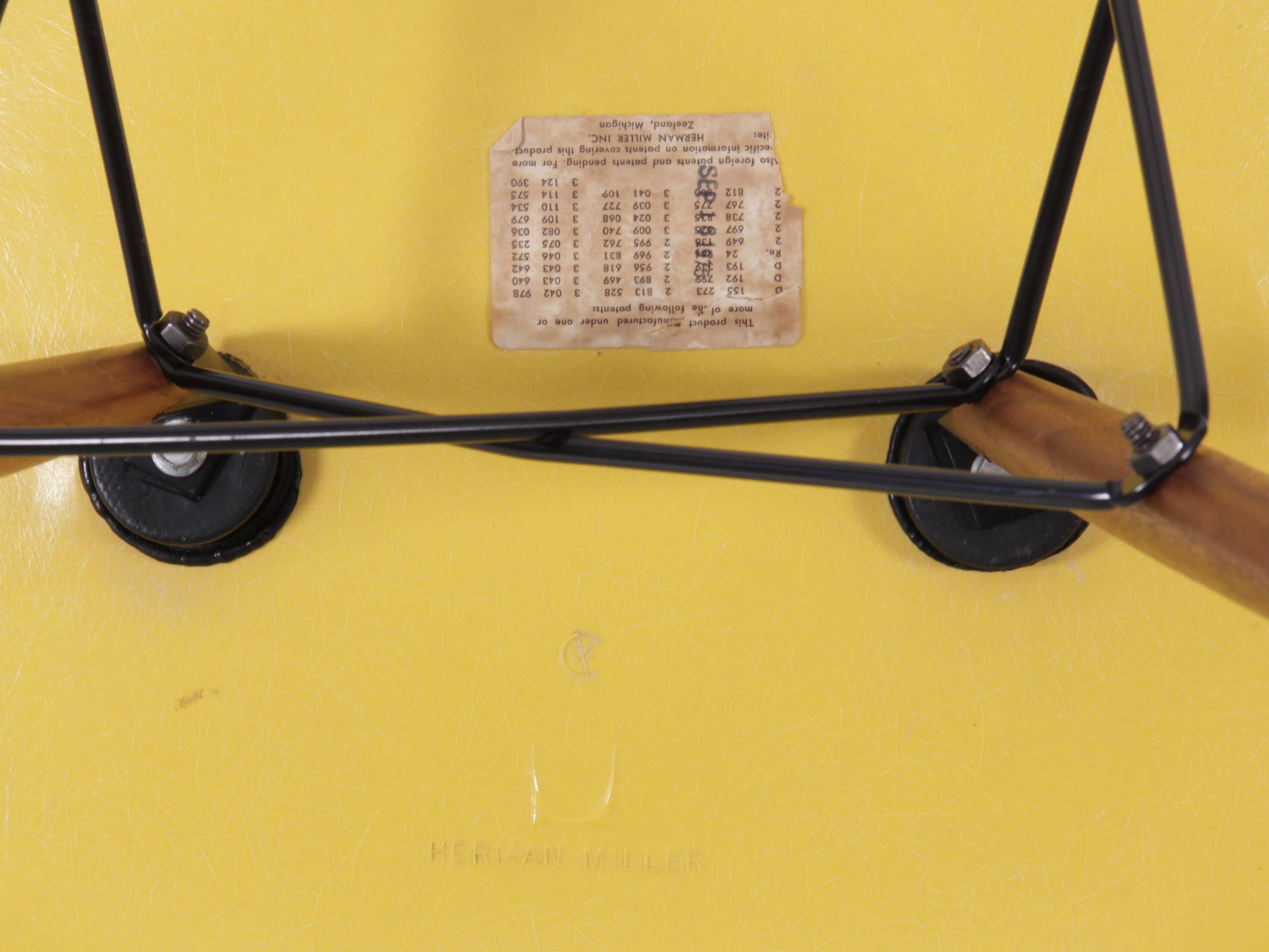 Set of 4 DSW chairs by Charles Eames - yellow fibreglass edition by Herman.