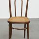 Bistro chair with a woven cane seat