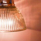 Suspension in ridged glass and support in polished cast aluminum