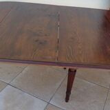 Extendable mahogany table with 6 tapered and fluted legs, Louis XVI style