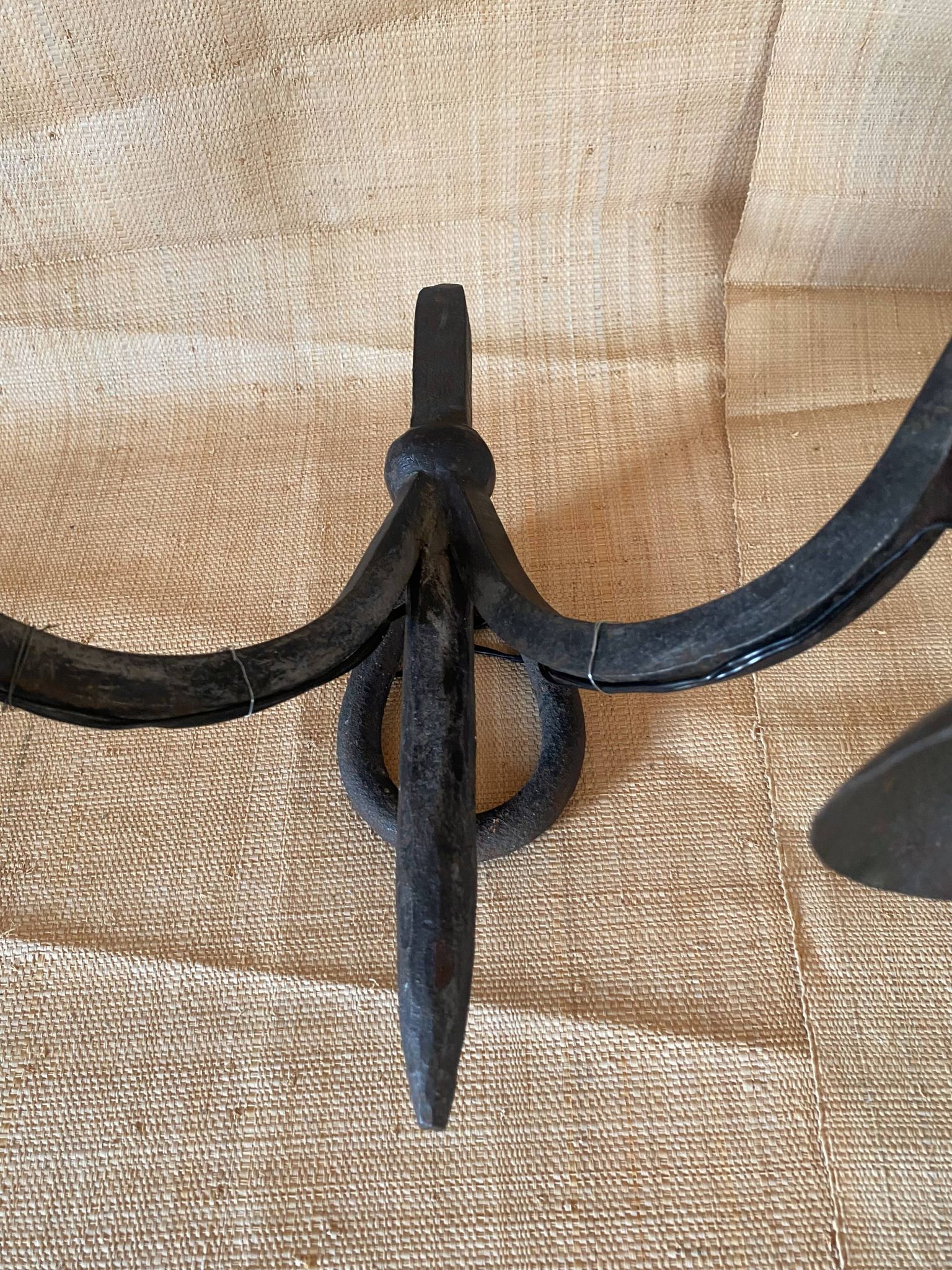 Wrought iron wall lights.