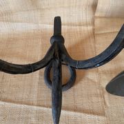 Wrought iron wall lights.