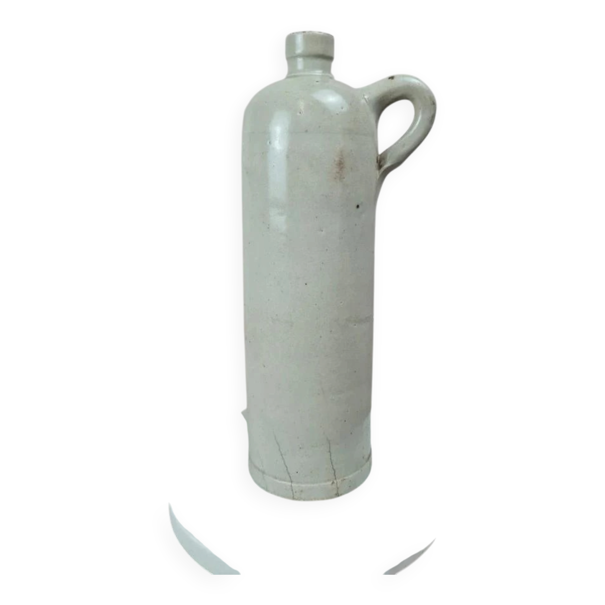 Antique beige glazed stoneware bottle from the 19th century, with a handle, vintage decor.