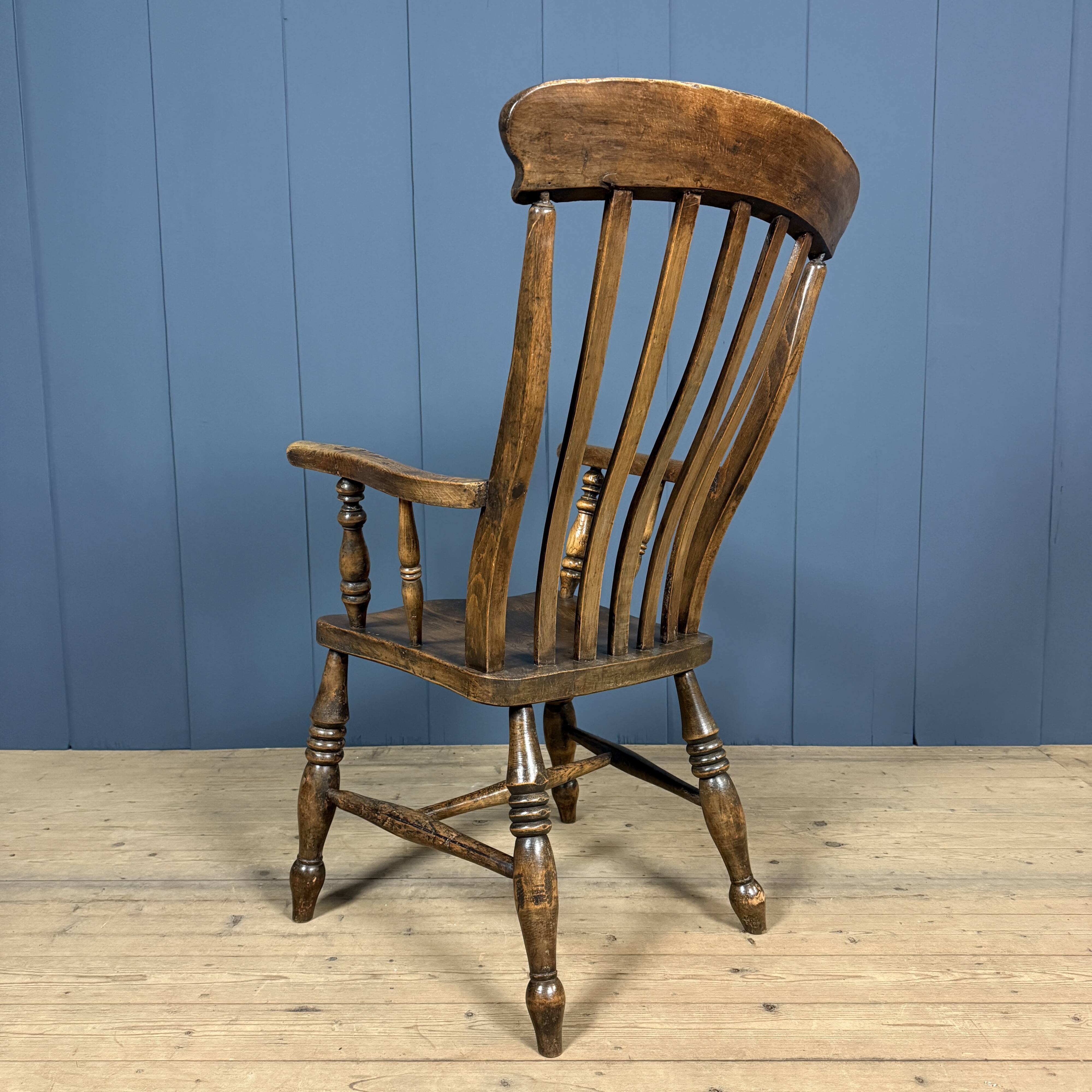Brown English Windsor armchair with high back