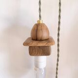 Wooden portable lamp with green cable