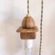 Wooden portable lamp with green cable