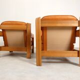2 fauteuils en chêne et cuir cognac par Skilla