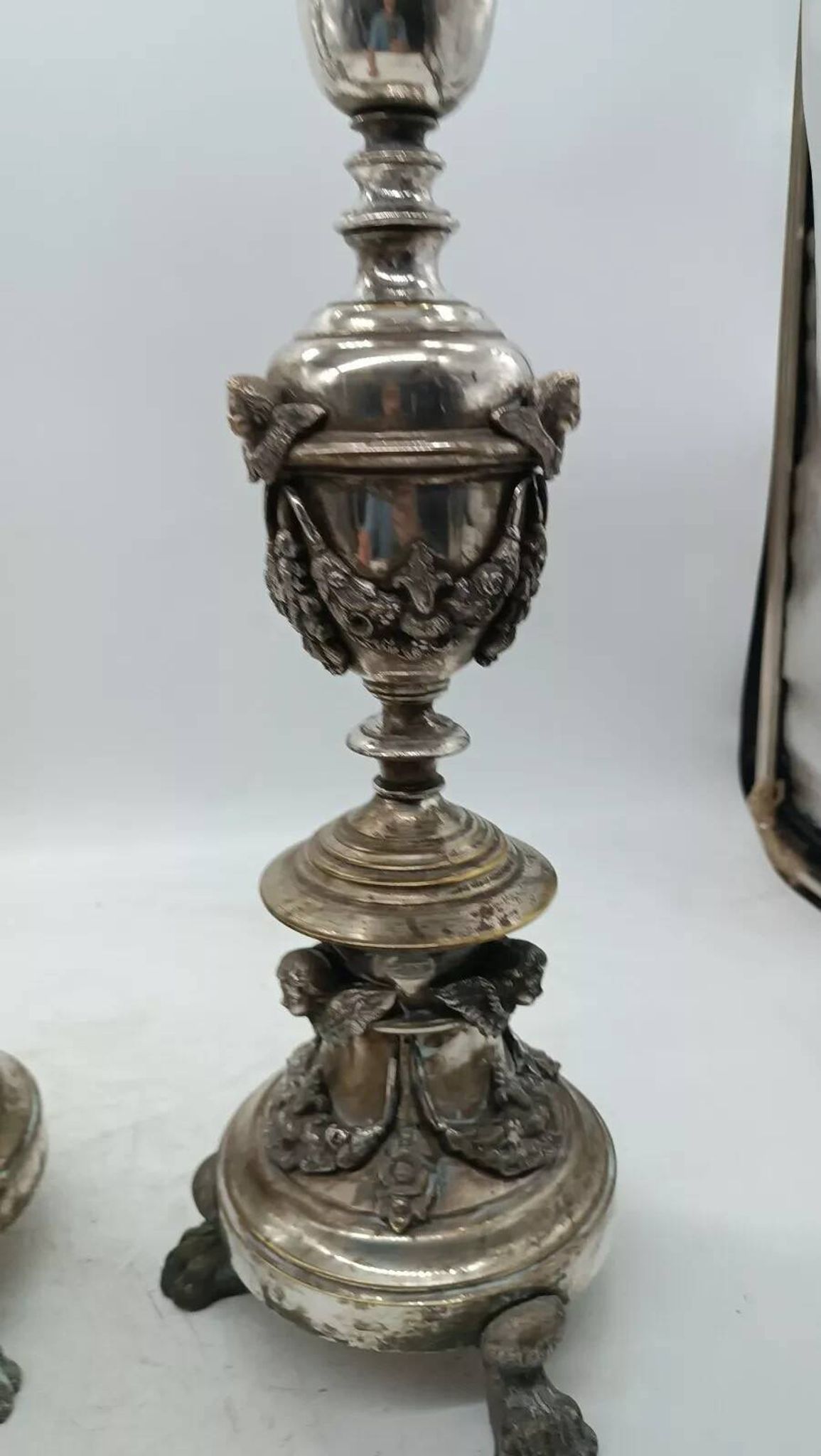 Pair of silver-plated bronze candlesticks in the Empire style, early 19th century, height 70 cm