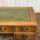 English flat desk with drawers from the 1970s in fir and leather top.