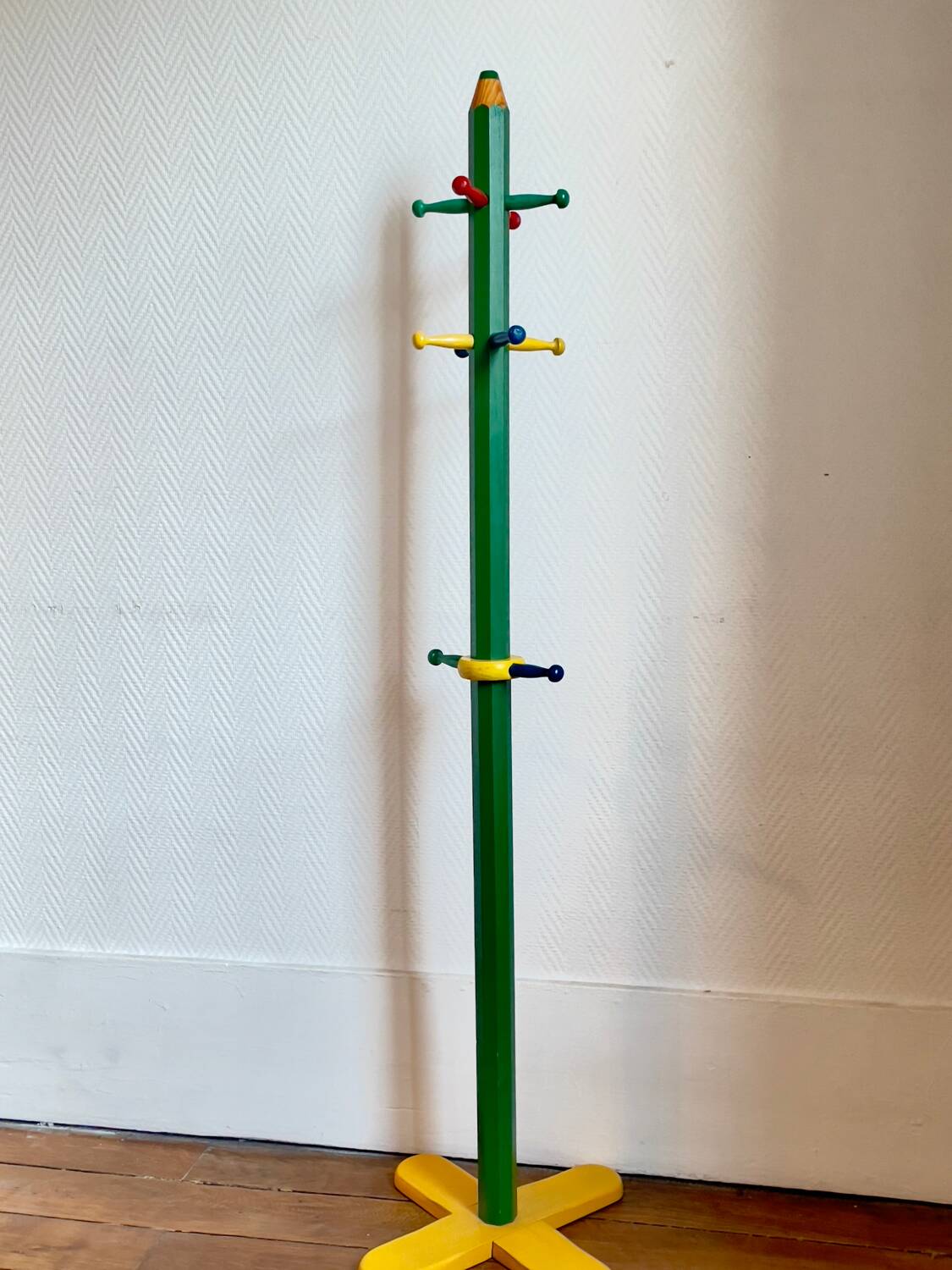 Pencil coat rack for children by Pierre Sala.