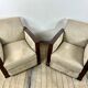 Pair of Art Deco armchairs in rosewood and suede.