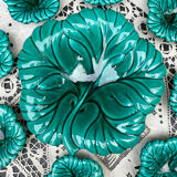 Salad bowl and small bowls in leaf-shaped slipware